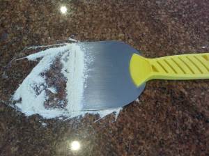 A large paint scraper or putty knife makes short work of cleaning flour off the work surface after making dough or pastry